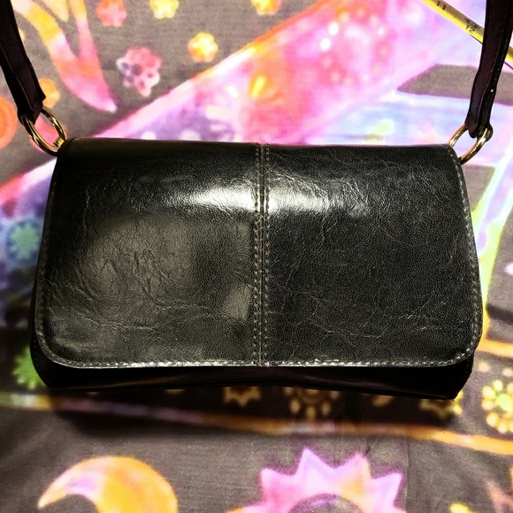 Liz Claiborne Handbags - Small Black Hand Bag  By Liz Claiborne
